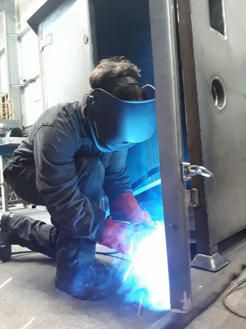 Sparks fly! Augustin welding a Water Bowser.